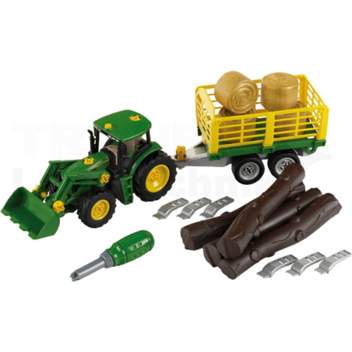 Traktor mit Holz- und Heuwagen