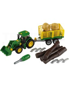 Traktor mit Holz- und Heuwagen